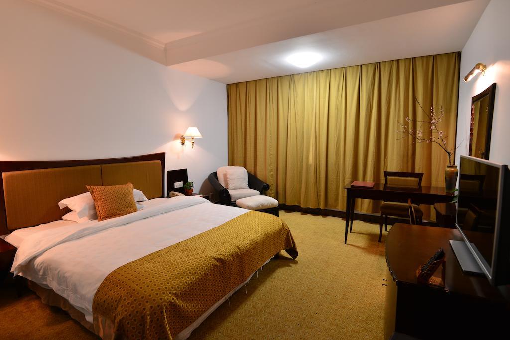 Baodao Exhibition Center Hotel Wuyishan  Quarto foto