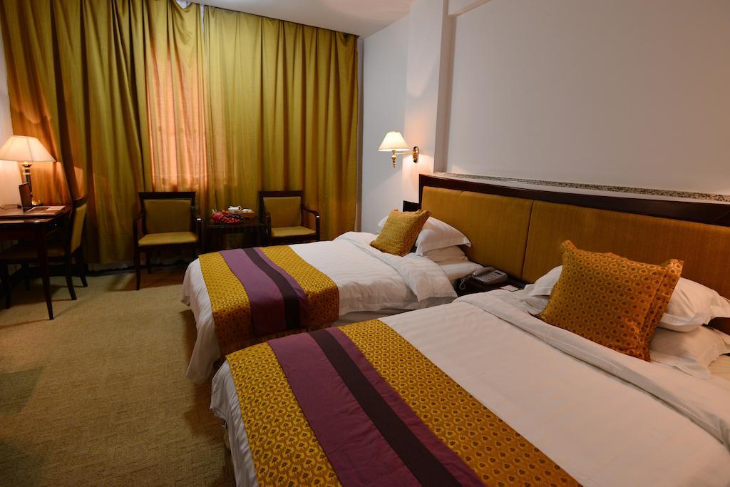 Baodao Exhibition Center Hotel Wuyishan  Quarto foto