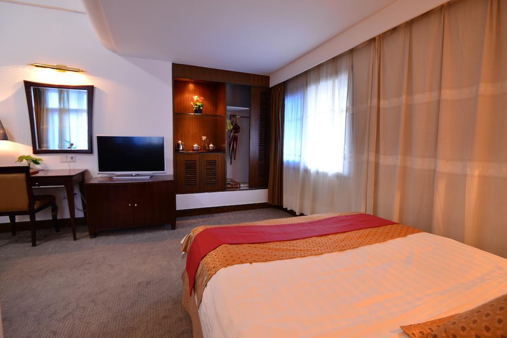 Baodao Exhibition Center Hotel Wuyishan  Quarto foto